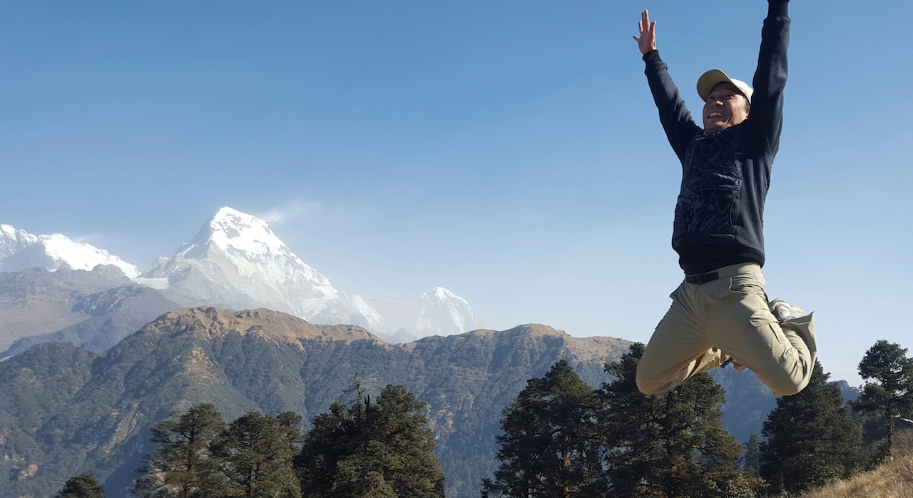 Jumping joy with nature and mountains Poonhill trek