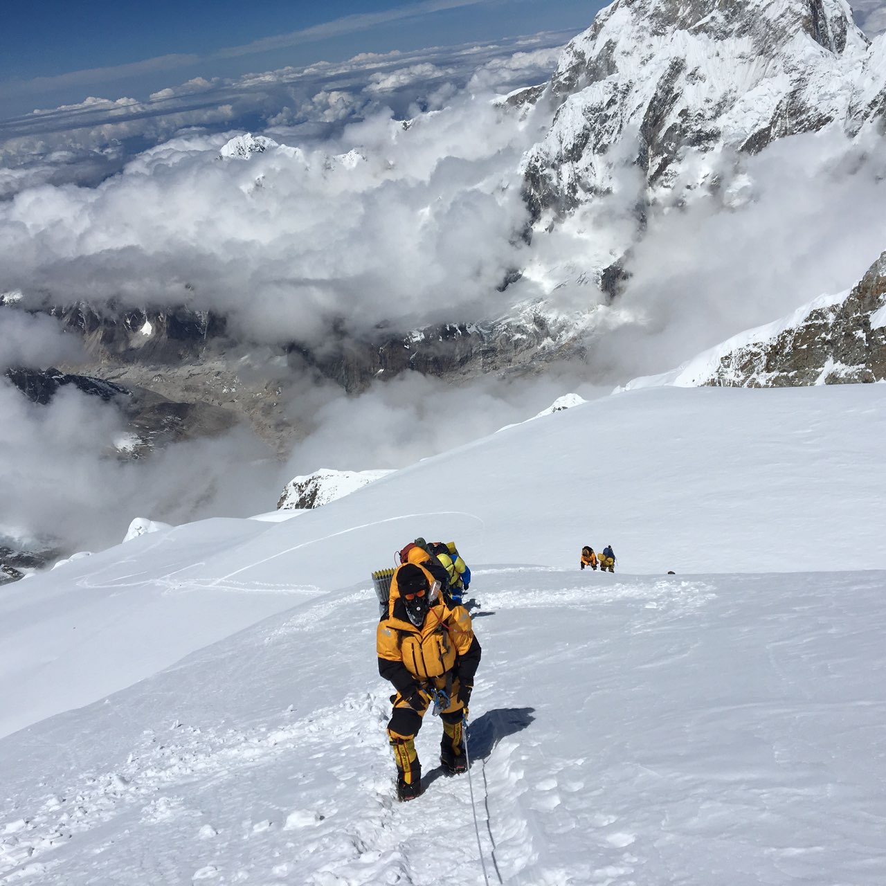 Climbers climbing Mt. Kanchenjunga