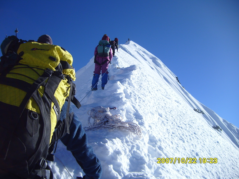 Climbers climbing to the summit of Island peak ridge 