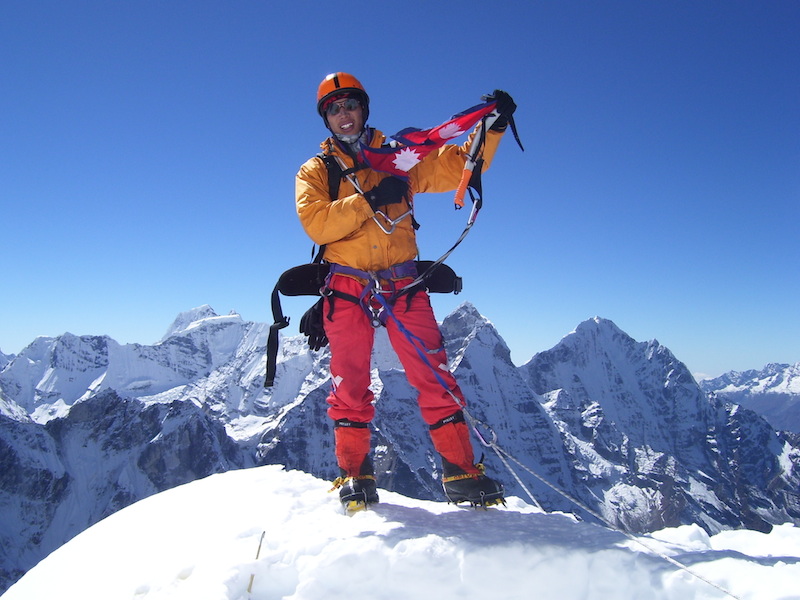 Kusang Tenzing sherpa on the summit 