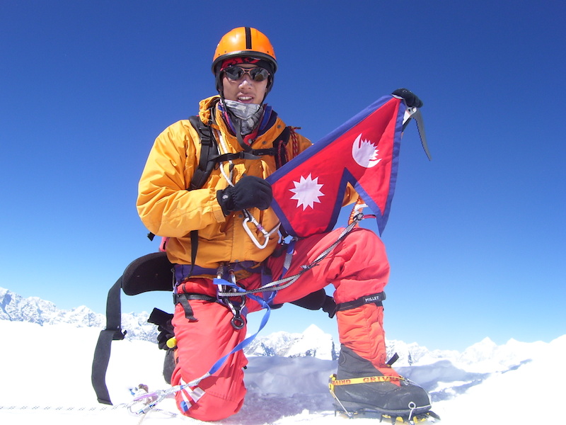 Kusang Tenzing sherpa on the summit of Island Peak 